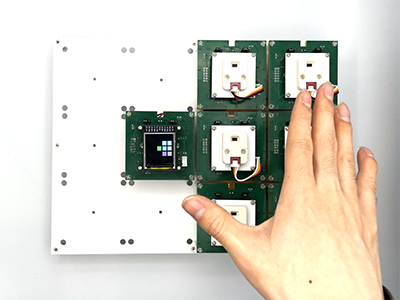 CommuTiles: Shape-Changeable Modular Computer System Using Proximity Wireless Communication